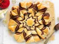 Stella di pasta sfoglia con Nutella, un dolce invitante pronto per essere gustato.