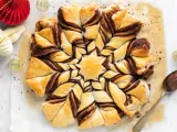 Stella di pasta sfoglia con Nutella, un dolce invitante pronto per essere gustato.